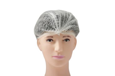 Ühekordsed mütsid valged kahe kummiga 53 cm 100 tk